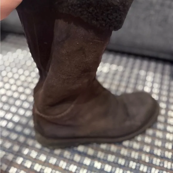 - Suede Shearling Knee High Boots in the color brown