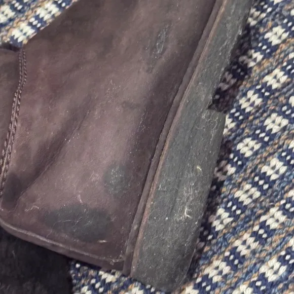 - Suede Shearling Knee High Boots in the color brown