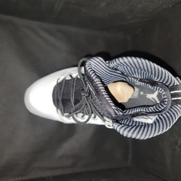 #134 Jordan 9 retro White and Black High-Top Sneakers