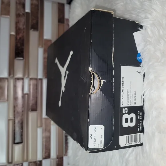 #134 Jordan 9 retro White and Black High-Top Sneakers