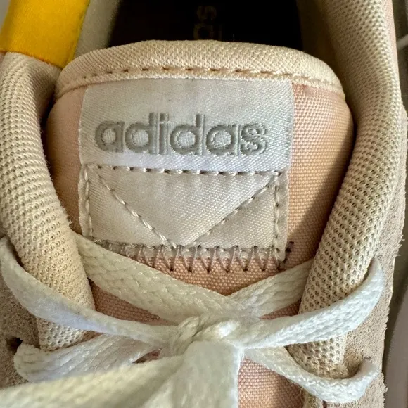 Adidas-Retrorun running sneakers from Finish Line in pink and white.Size 9