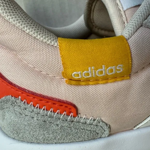 Adidas-Retrorun running sneakers from Finish Line in pink and white.Size 9