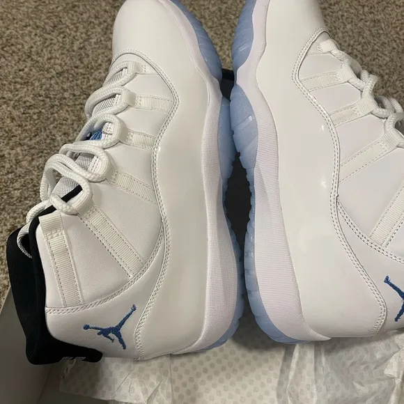 Air Jordan 11 Retro White and Blue Sneakers. Brand new with box. Never worn.