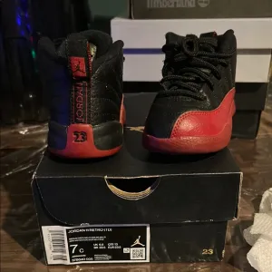 Air Jordan 12 Retro Black and Red Sneakers