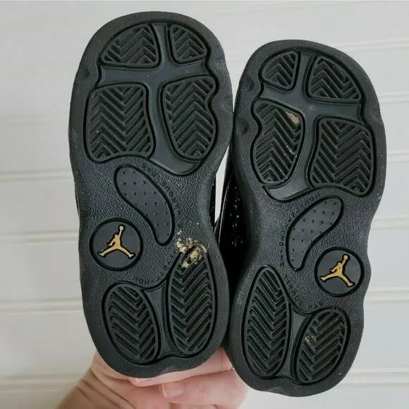 Air Jordan 13 Retro Black Metallic Gold Sneakers