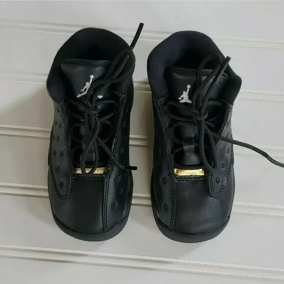 Air Jordan 13 Retro Black Metallic Gold Sneakers