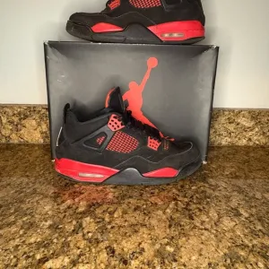 Air Jordan 4 retro red thunder- certified through GOAT