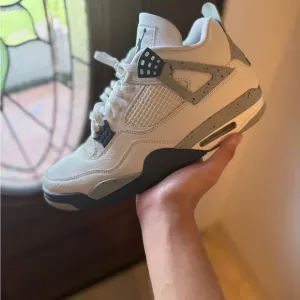 Air Jordan 4 Retro White Sneakers