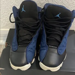 Air Jordan Retro Blue and Black Sneakers
