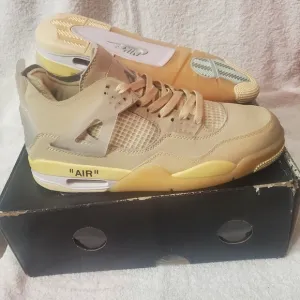 Air Jordan Retro Sneakers in Beige and Yellow