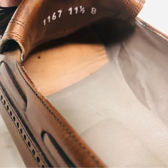 Bally Tassled Kilti Wingtip Loafers