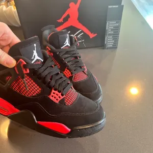 Black and Red Air Jordan Sneakers