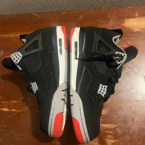 Black and Red Athletic Sneakers Air Jordan 4 Retro OG Bred 2019 Nike