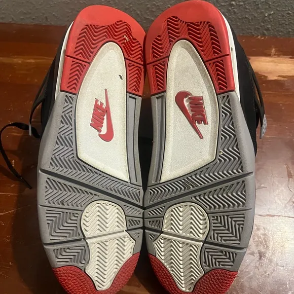 Black and Red Athletic Sneakers Air Jordan 4 Retro OG Bred 2019 Nike