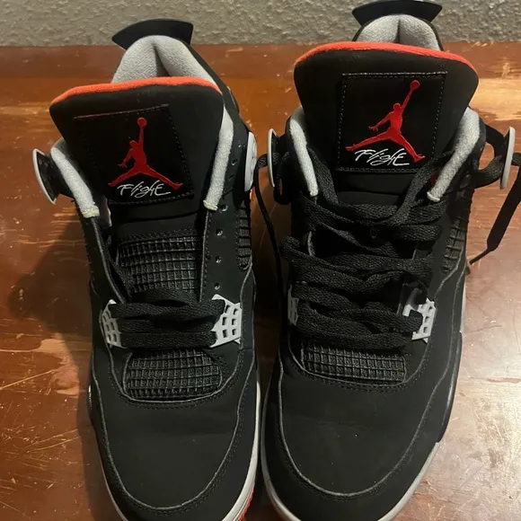 Black and Red Athletic Sneakers Air Jordan 4 Retro OG Bred 2019 Nike