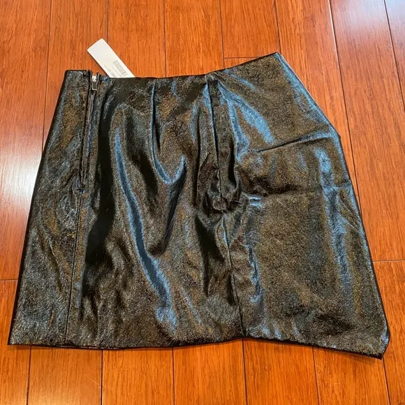 Black Metallic Faux Leather asymmetrical bow tie skirt mini skirt​​