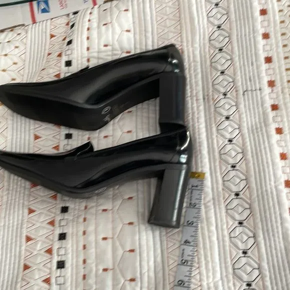 Coach, black patent leather heeled, loafers size 10