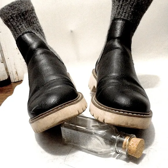 Dolce Vita Black Leather Knit Wool Sock Boots with contrast white lug soles