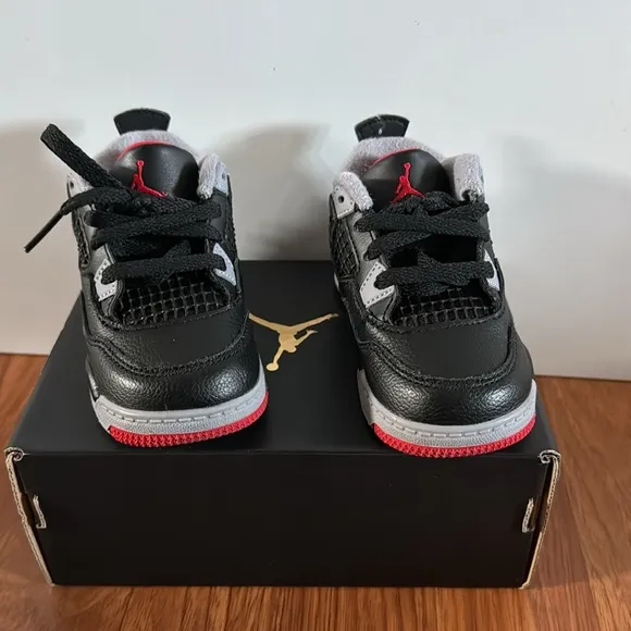 EUC Jordan 4 Retro Kids Black and Red Sneakers