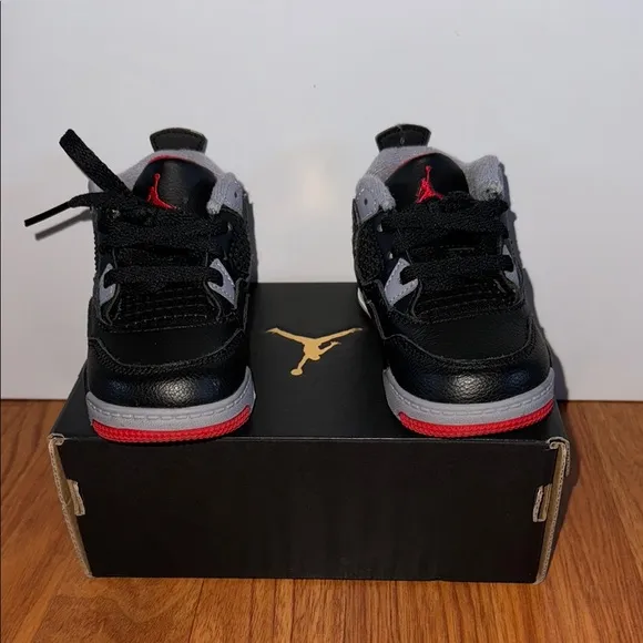 EUC Jordan 4 Retro Kids Black and Red Sneakers