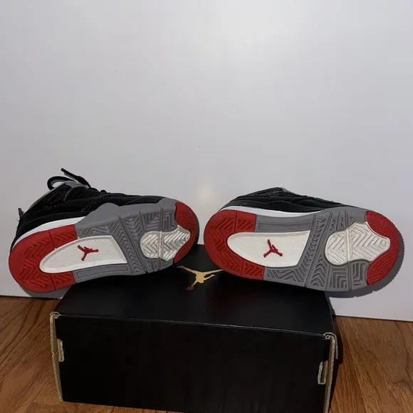 EUC Jordan 4 Retro Kids Black and Red Sneakers