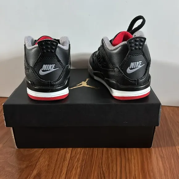 EUC Jordan 4 Retro Kids Black and Red Sneakers