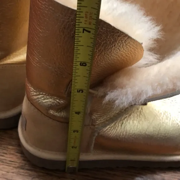 Gold UGG Button Up Boots. NWOT size 4