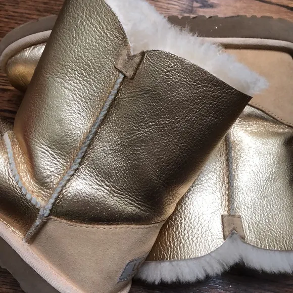 Gold UGG Button Up Boots. NWOT size 4