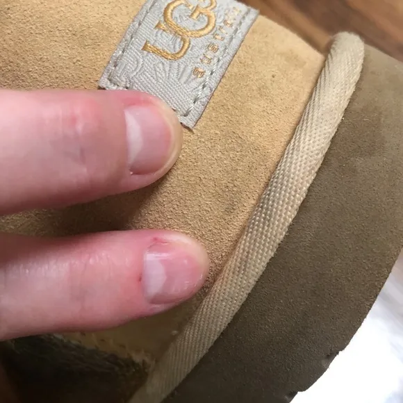 Gold UGG Button Up Boots. NWOT size 4