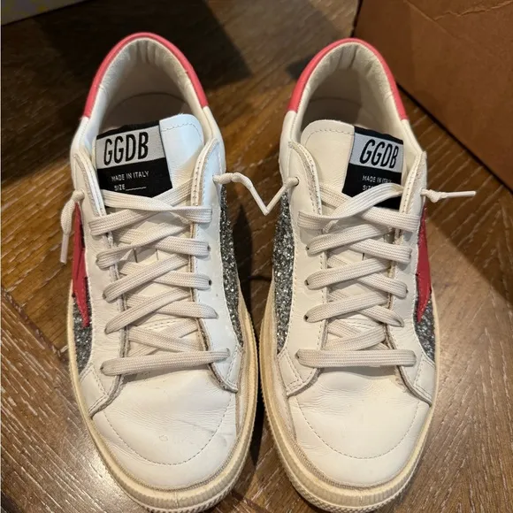 Golden Goose dark pink and white sneakers