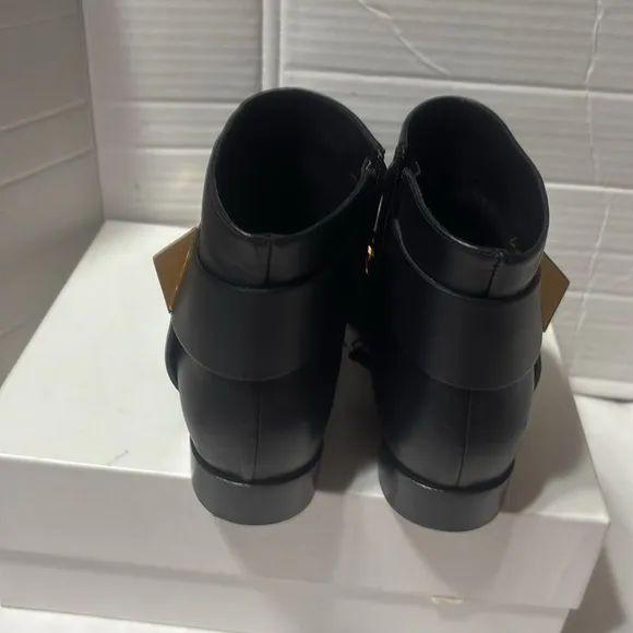 Guiseppe Zanotti Black Ankle Boots with Gold Accent scud and side zipper. EUC