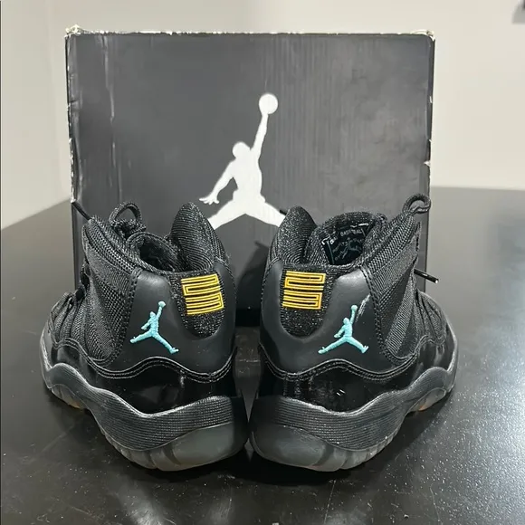 JORDAN 11 RETRO Kid’s Black Jordan Sneakers