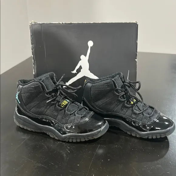 JORDAN 11 RETRO Kid’s Black Jordan Sneakers