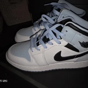 Jordan Blue and White Sneakers Iconic Design