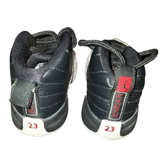Jordan Retro Black High-Top Sneakers with White Sole and Lace-Up Design 5.5C