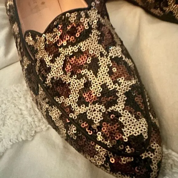 Kate Spade Caty leopard print and sequin loafers.