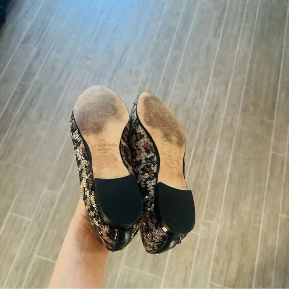 Kate Spade Caty leopard print and sequin loafers.