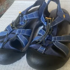 Keen closed toe and heel sandals excellent condition.  Runs big