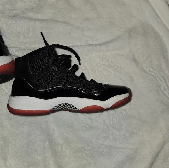 Kids Black and Red Jordan Sneakers