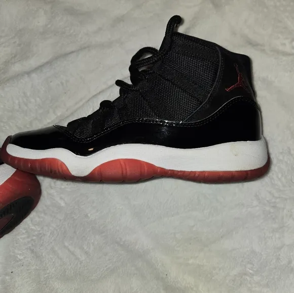 Kids Black and Red Jordan Sneakers