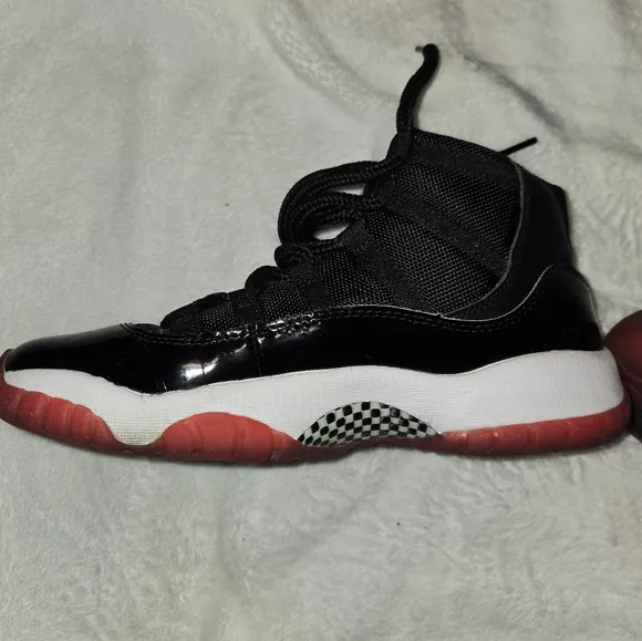 Kids Black and Red Jordan Sneakers
