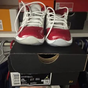 Kids Red and White Jordan Sneakers