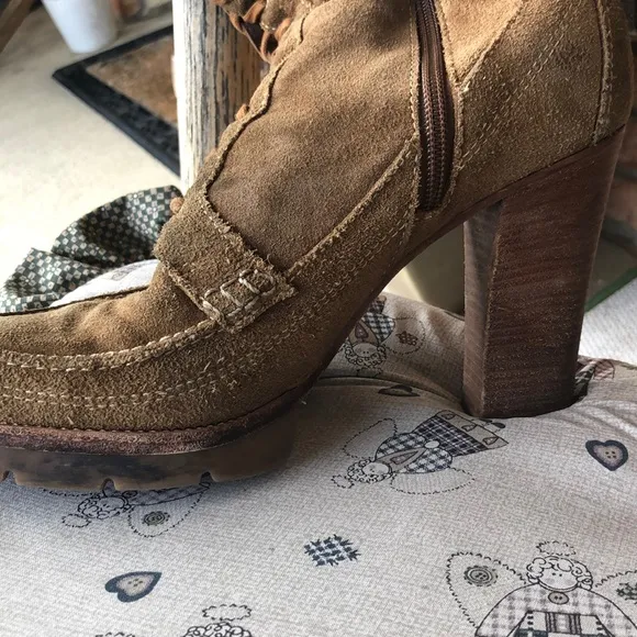 Michael Kors Brown suede lace up zip up platform heels.