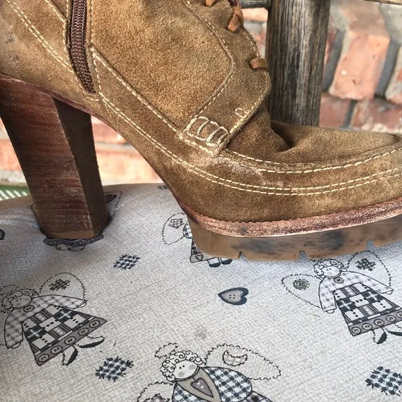 Michael Kors Brown suede lace up zip up platform heels.