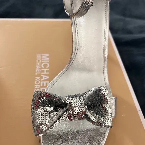 Michael Kors Paris Sequin Bow Silver High Heel. new never worn