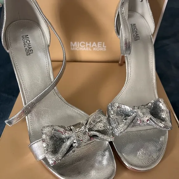 Michael Kors Paris Sequin Bow Silver High Heel. new never worn