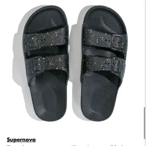 New Freedom Moses Black Supernova 2 strap sandals w/ tiny flecks of rainbow