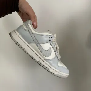 Nike Dunk Low grey and white sneakers