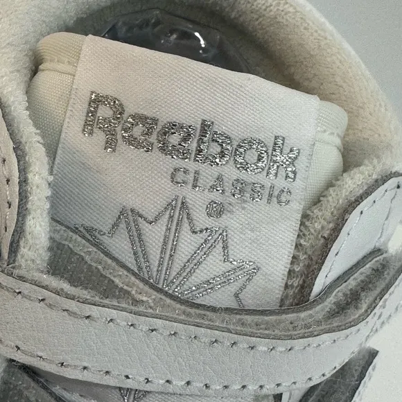 NWOT Reebok Freestyle Women’s High Top White/Silver Metallic Sneakers-8.5