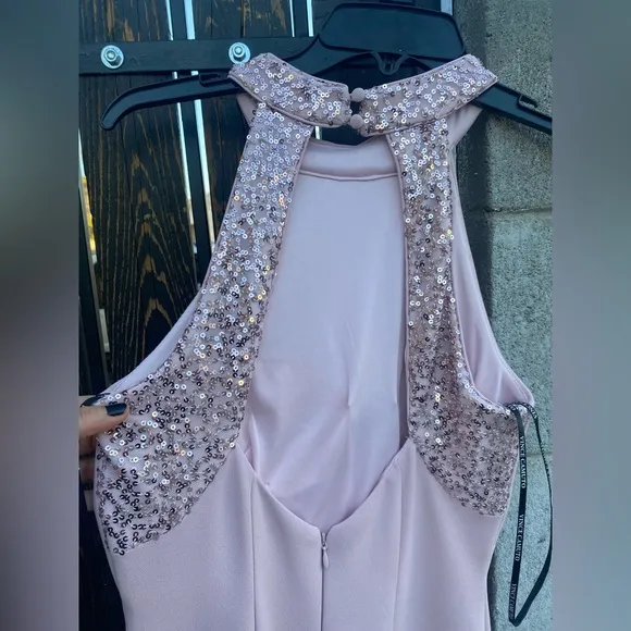 NWT Vince Camuto Halterneck Embellished dress has a high-cut hemline slit size 2